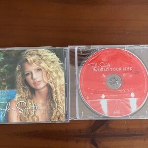 2 Taylor Swift CDs self titled debut and World Tour Live